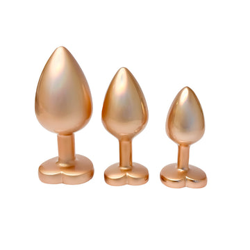 Gleaming Pearl Gold Butt Plug Set – 3 Sizes with Heart Gemstones